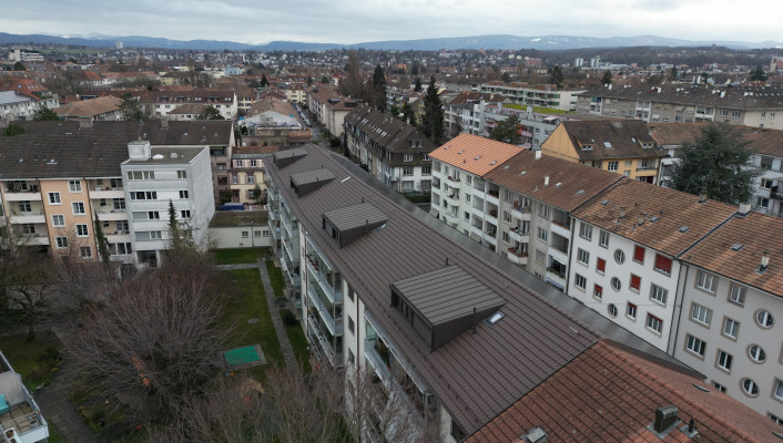 Dachsanierung Photovoltaikanlage_Wohngenossenschaft Ettinger Hof, Basel